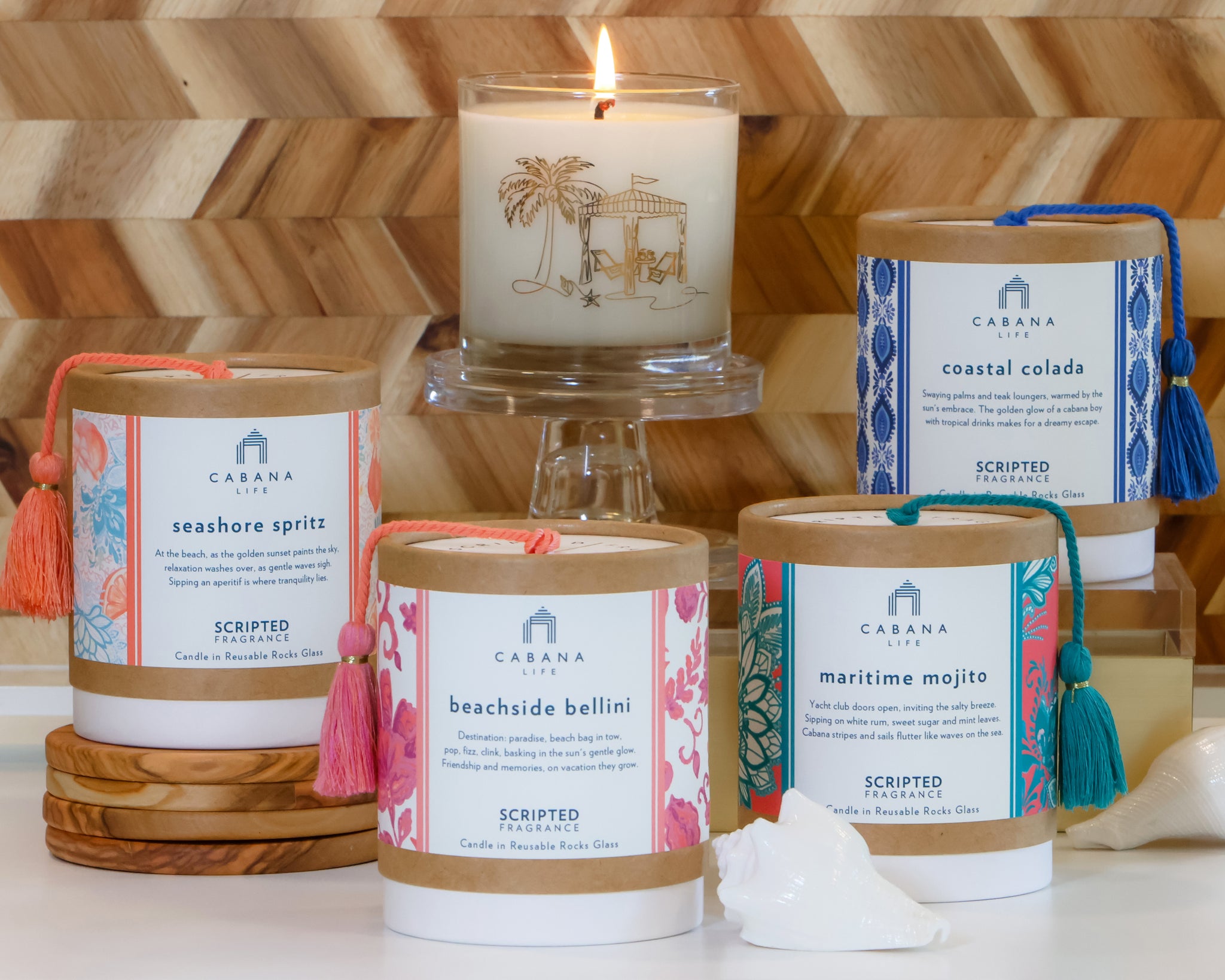 A sun-drenched Coastal Colada candle housed in a 22k gold glass—pairs beautifully with the brand’s signature UPF 50+ beach dresses.