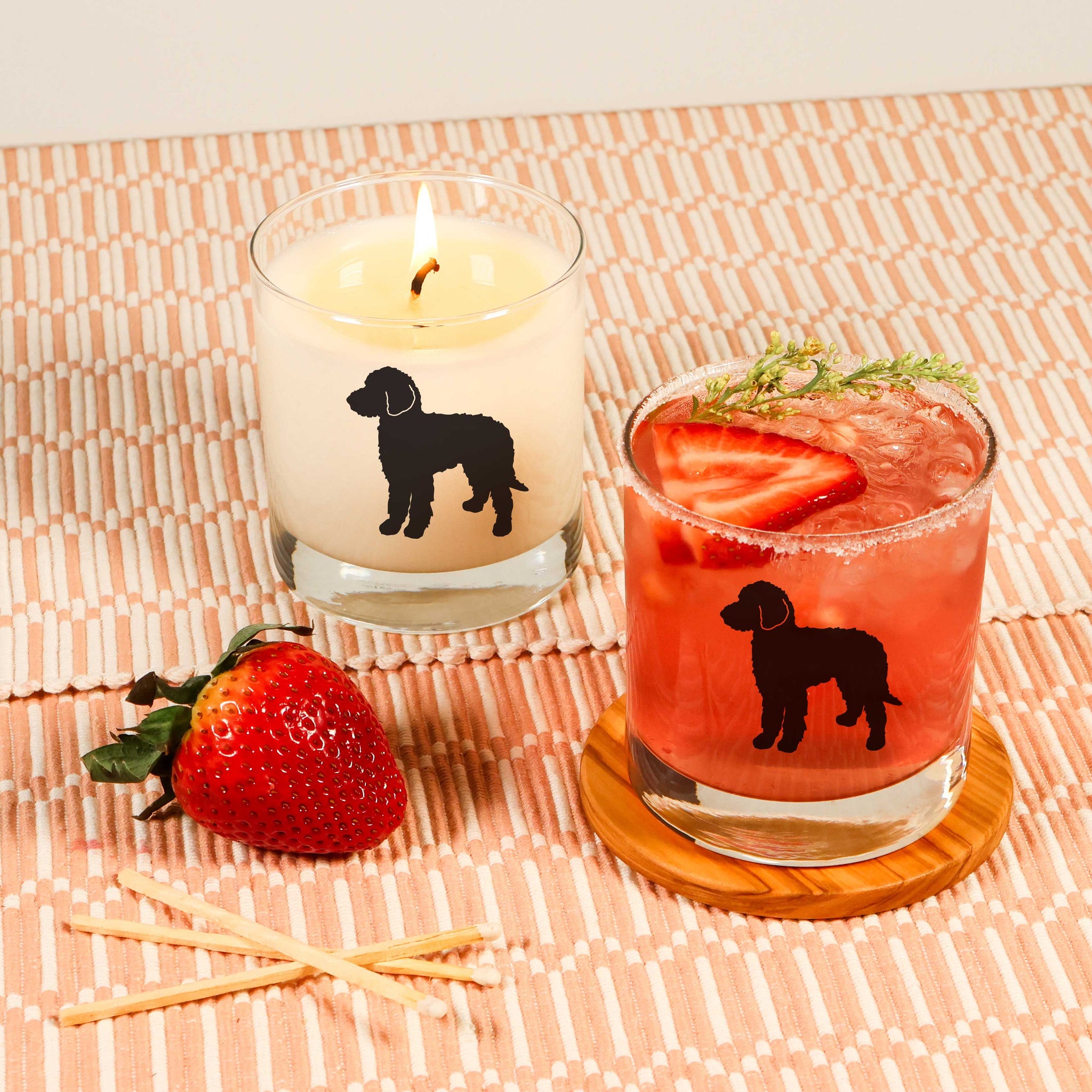 Eco-conscious goldendoodle candle in drink-safe glass