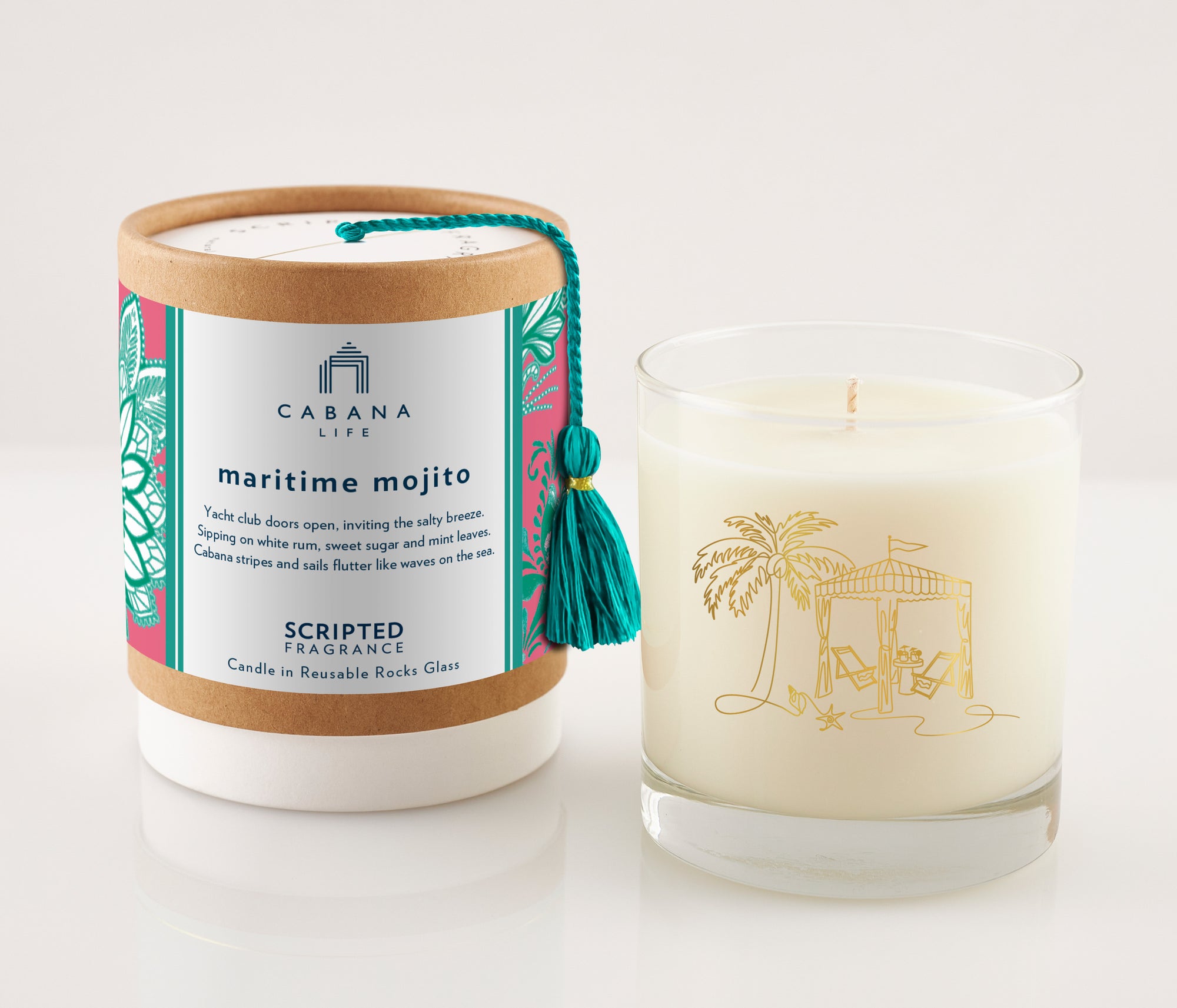 Fresh and energizing Maritime Mojito candle in a 22k gold reusable glass, crafted with 100% soy wax—pairs perfectly with Cabana Life’s nautical striped tunics.