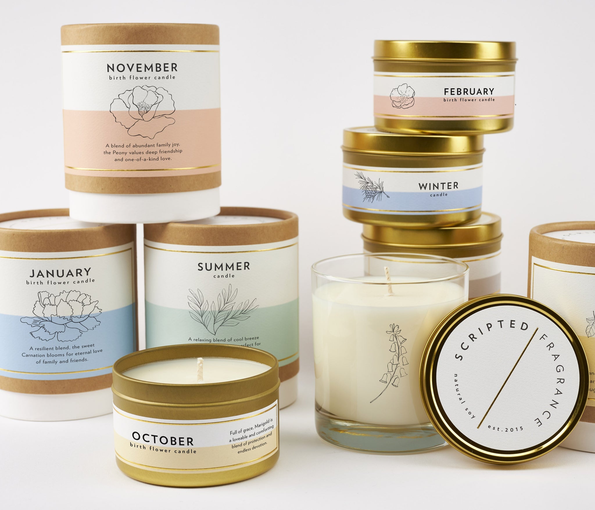 Collection of seasonal and birth flower candles in reusable rocks glasses and gold tins, featuring floral scents for every month, hand-poured with 100% soy wax, non-toxic, perfect for gifting or home decor year-round