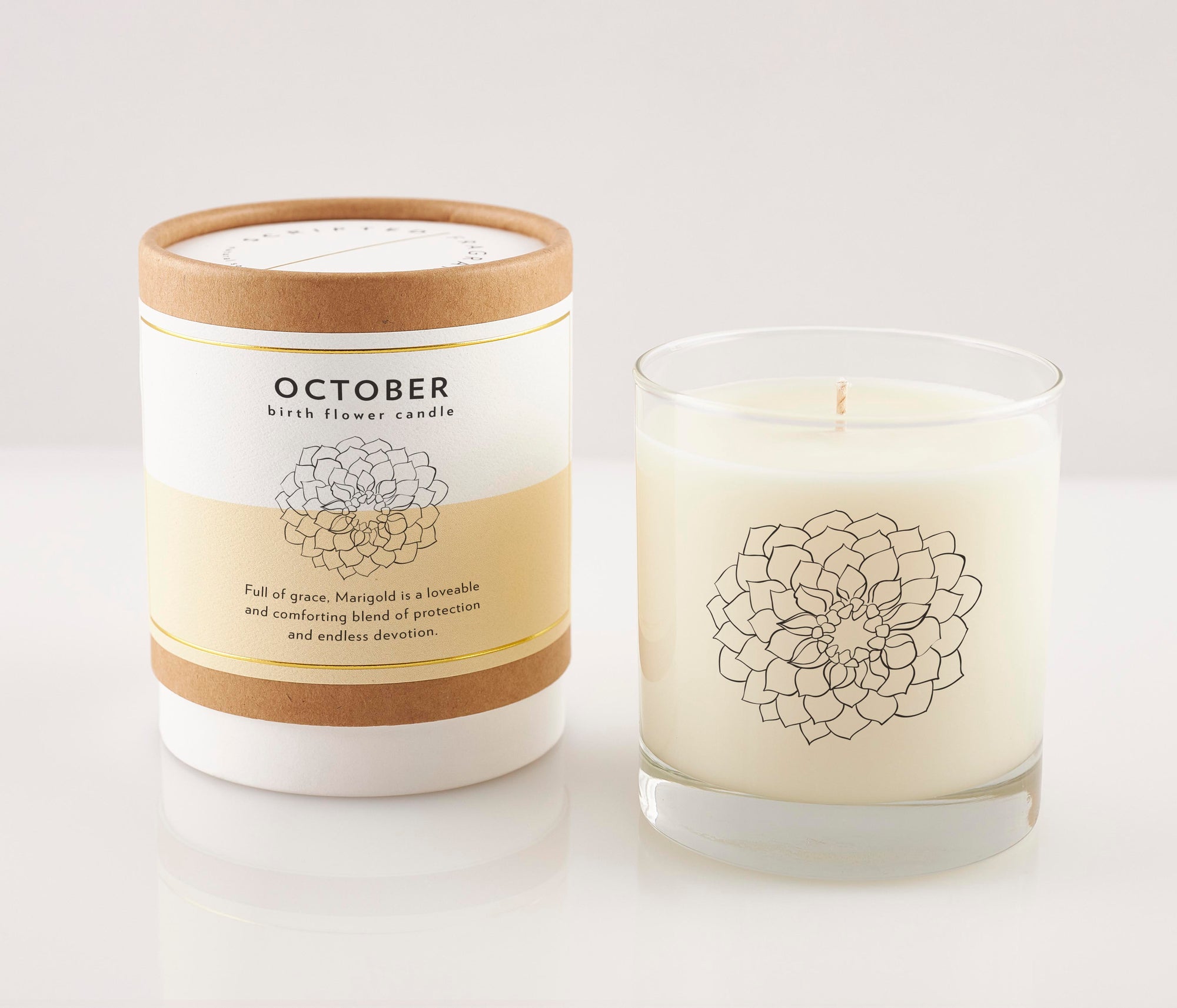 October Marigold Candle in reusable drinking glass with soft floral scent, 100% soy wax, perfect for birthday gifts