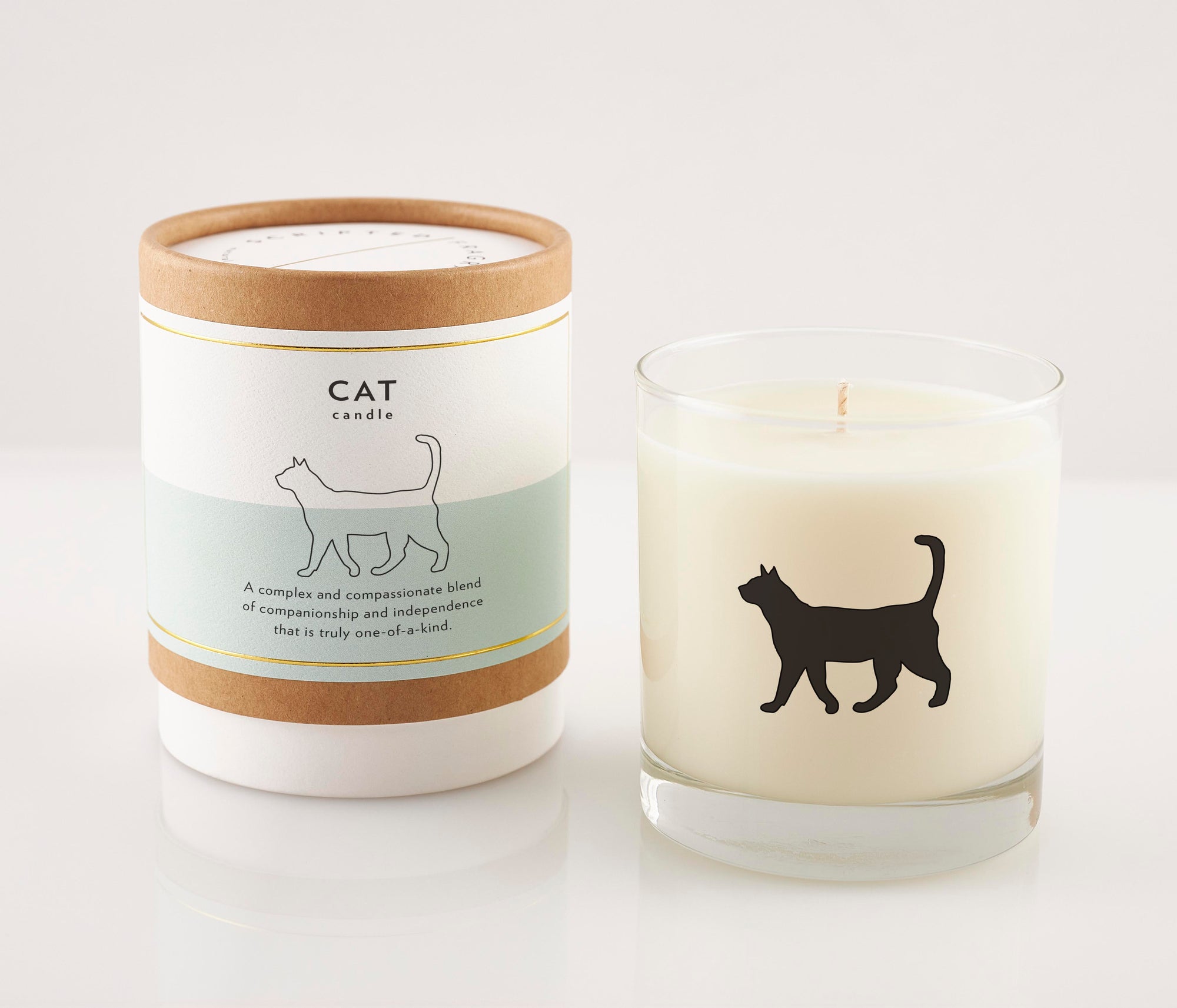 Cat-themed soy candle in reusable glass with minimalist label