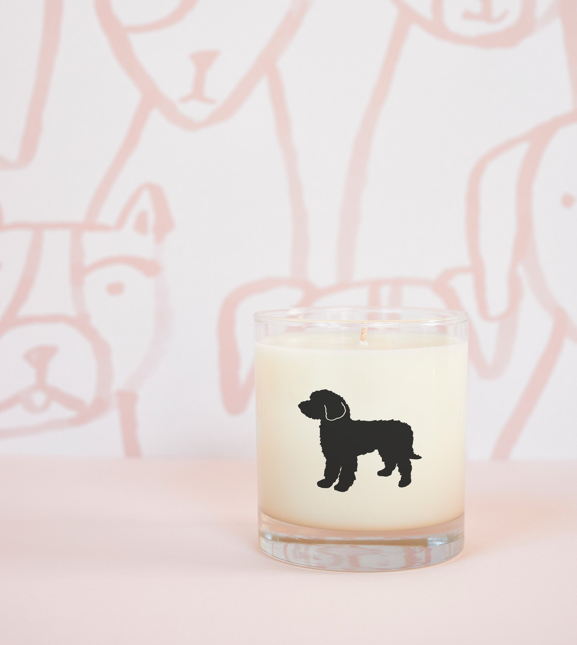 Eco-conscious goldendoodle candle in drink-safe glass