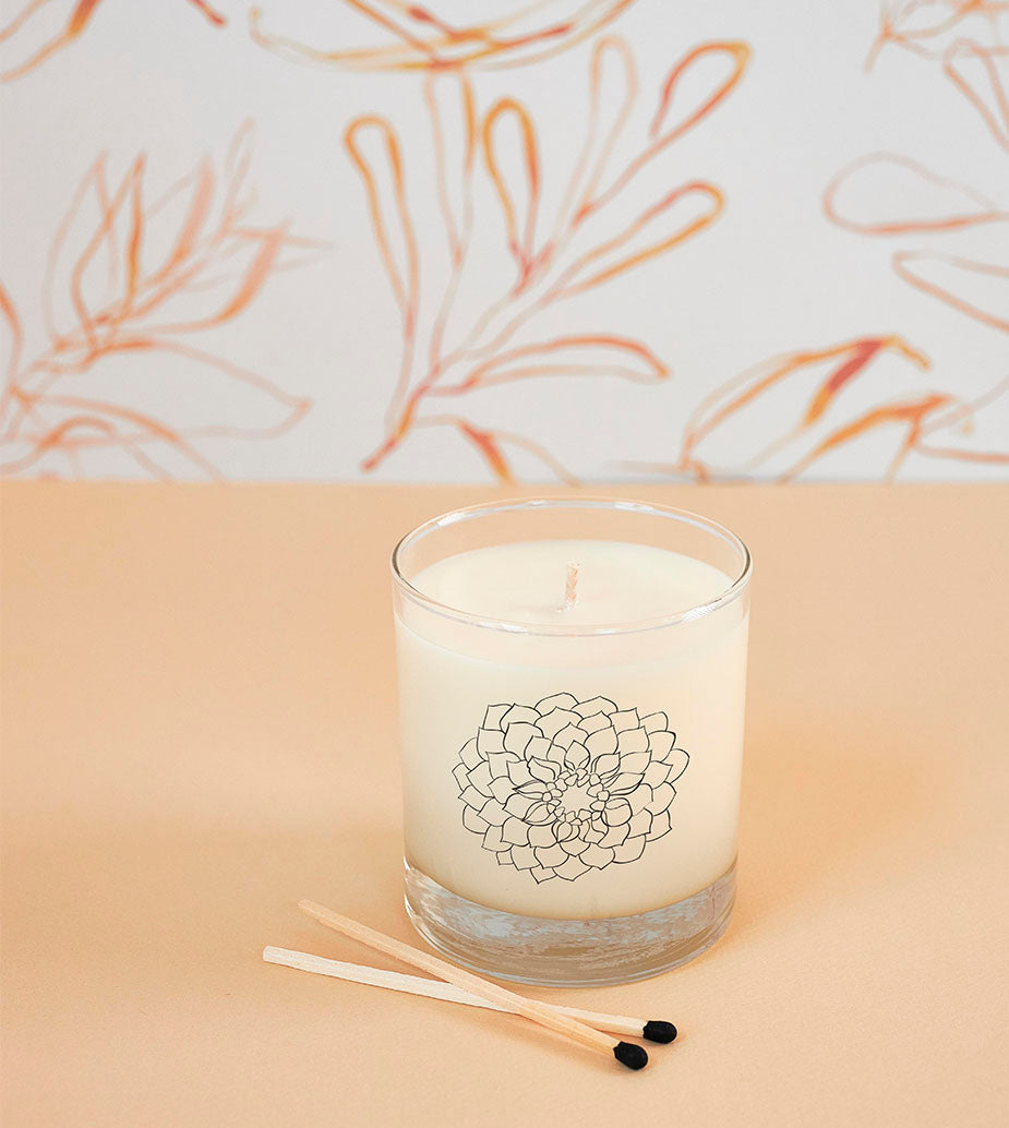 October Marigold Candle in reusable glass tumbler with vibrant floral scent, hand-poured using 100% soy wax, non-toxic, perfect for fall birthdays, autumn decor, or harvest gifting