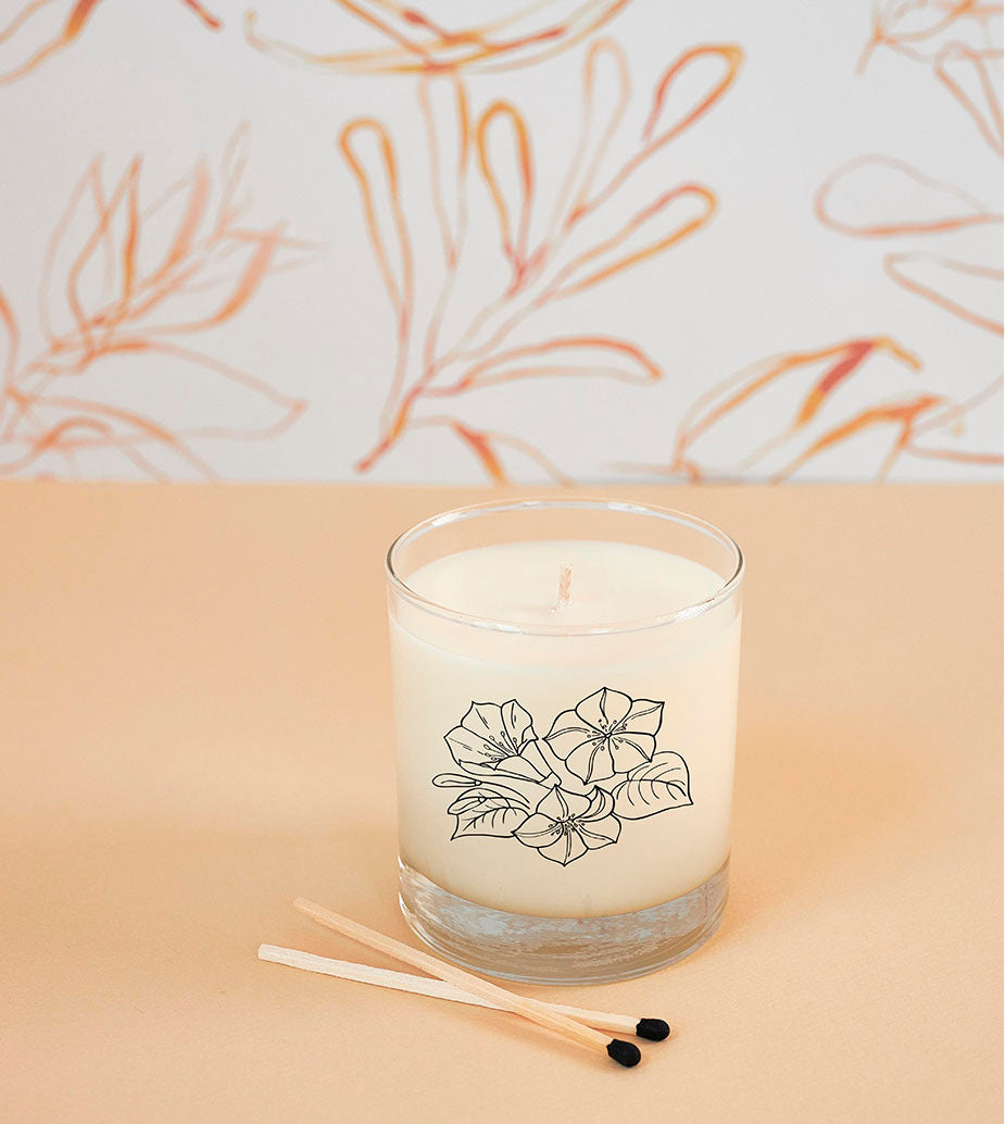 Elegant morning glory candle for September, hand-poured in reusable drinking glass, sustainable and gift-ready