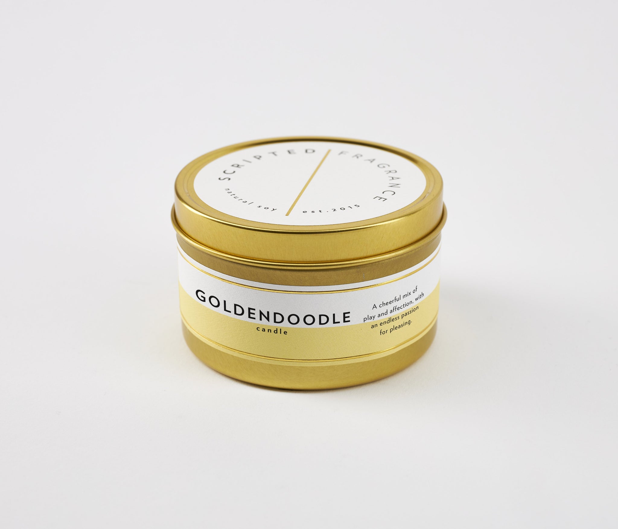 Goldendoodle travel candle in brushed gold tin container