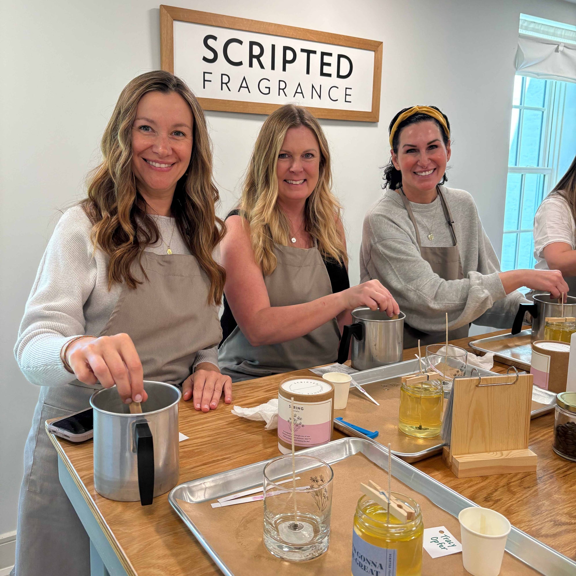 Multi-generational group at a Scripted Fragrance candle class