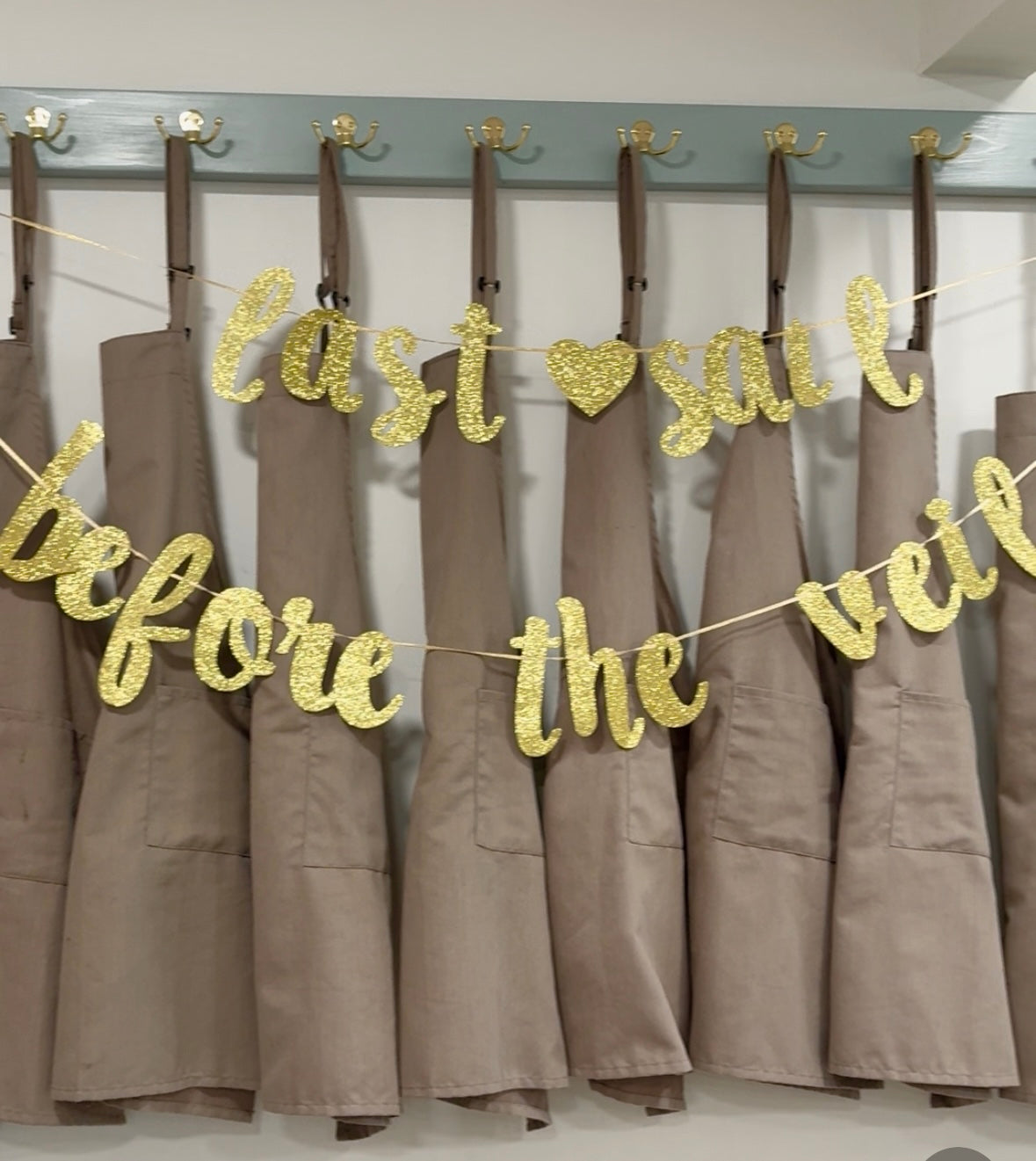 Bachelorette party banner reading "last sail before the veil"