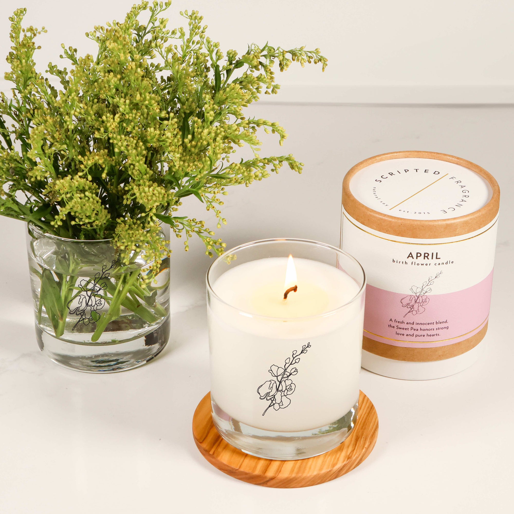 April Sweet Pea Candle in reusable drinking glass with delicate floral scent, hand-poured soy wax, non-toxic and ideal for spring birthday gifting